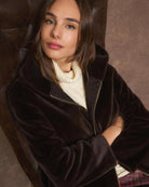 Close-up of zip fastening and plush faux fur texture