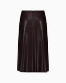 Front view of Betty Barclay faux leather A-line skirt with slash pockets and midi length