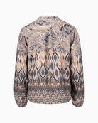 Back view of figure-skimming blouse with long sleeves and hip-length shape