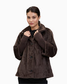 Plush A-line jacket with stand-up collar and press-stud front