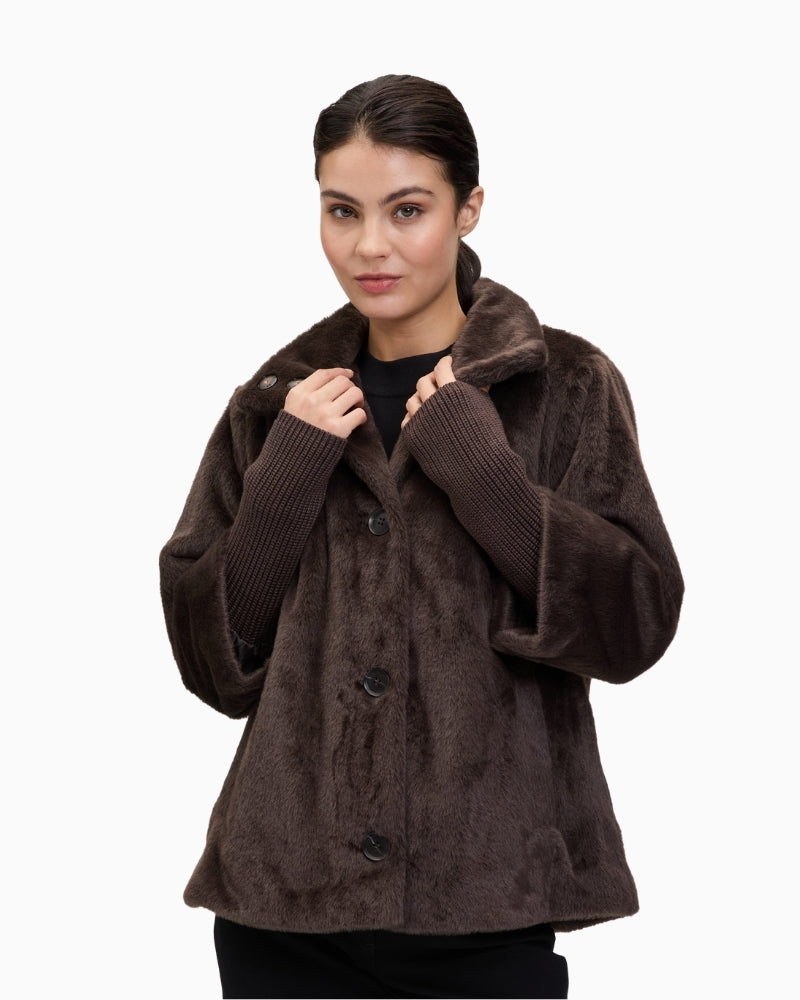 Plush A-line jacket with stand-up collar and press-stud front