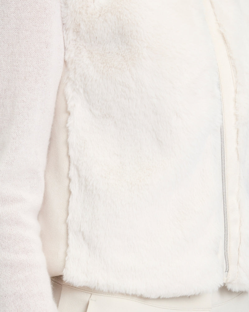 Close up of Plush sleeveless body warmer by Betty Barclay with zip front and stand-up collar