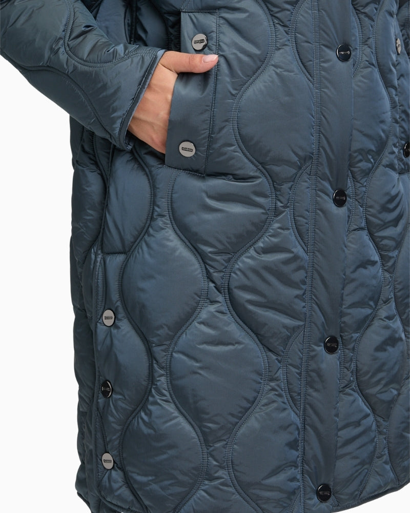 Detail of piped pocket and two-way zip on polyamide outer jacket