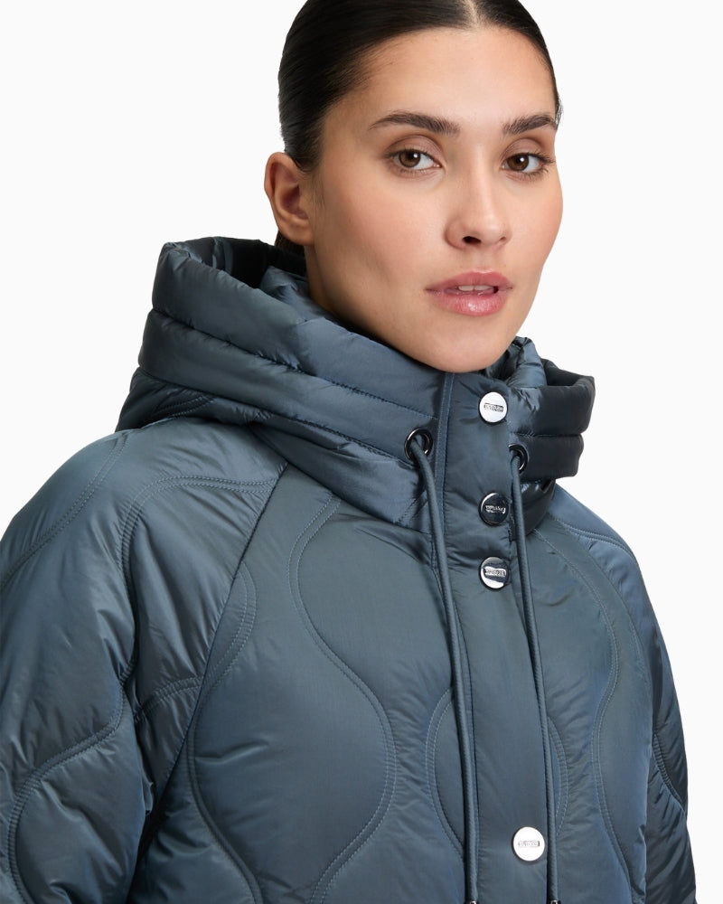 Detail of piped pocket and two-way zip on polyamide outer jacket