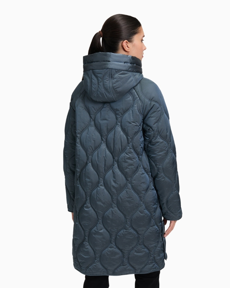 Back view of long quilted coat with lightweight texture and casual silhouette