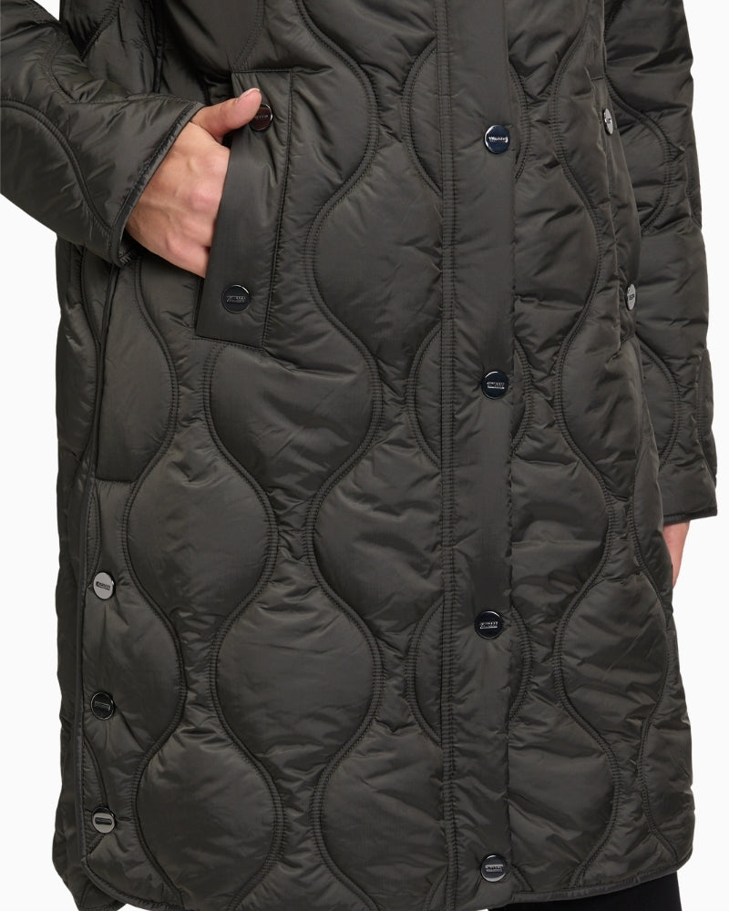 Close-up of piped pocket and zip detail on lightweight polyamide jacket