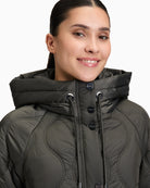 Close-up of piped pocket and zip detail on lightweight polyamide jacket