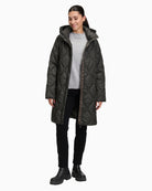 Front view of Betty Barclay long quilted jacket with hood and two-way zip