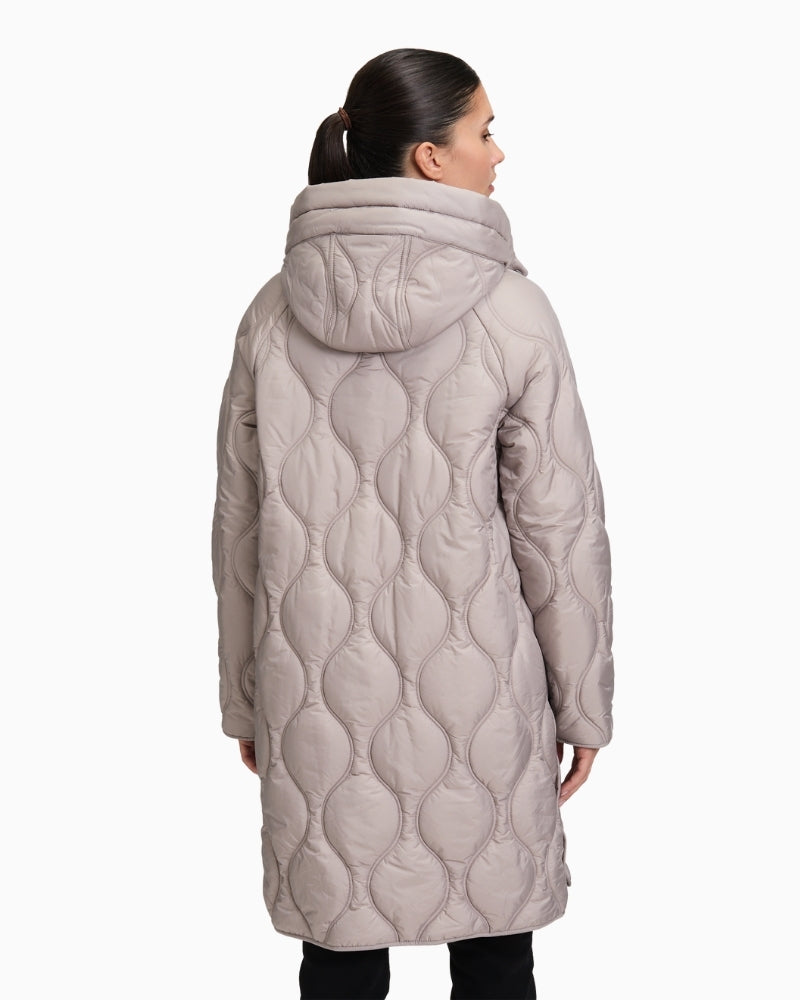Back view showing longline fit and subtle quilting pattern