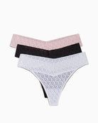 Flat lay of Calvin Klein 3-pack lace thongs in soft, breathable fabric