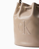 Calvin Klein taupe bucket bag embossed CK logo detail – Áines Boutique
