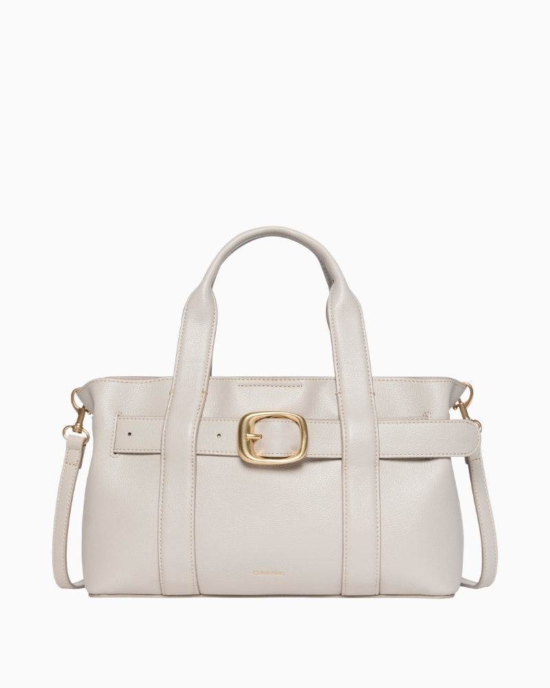 Front view of Calvin Klein taupe mini tote with buckle detail and top handles