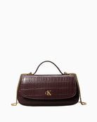Front view of brown Calvin Klein croc top handle bag with chain strap