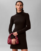 Calvin Klein burgundy puffer handbag worn on shoulder – Áines Boutique
