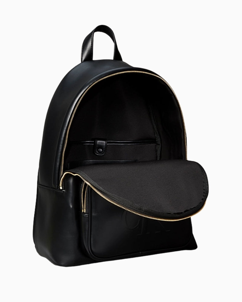 Detail of front zip, stitching and strap attachment