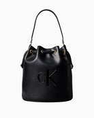 Front view of Calvin Klein embossed bucket bag with drawstring closure