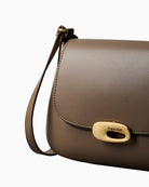 Calvin Klein hardware detail on taupe flap crossbody bag – Áines Boutique