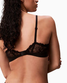 Back view of CK Perfect Coverage Bra in smooth black stretch fabric