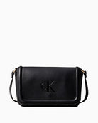 Front view of Calvin Klein soft-touch black crossbody bag with embossed logo