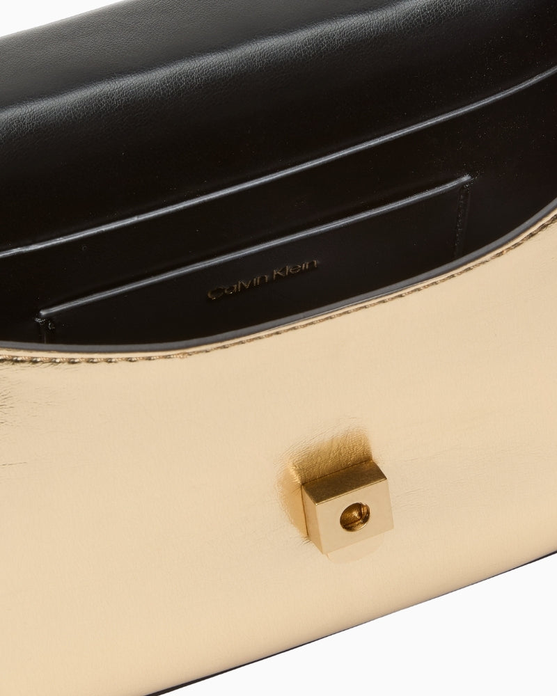 Calvin Klein gold metallic bag interior detail – Áines Boutique