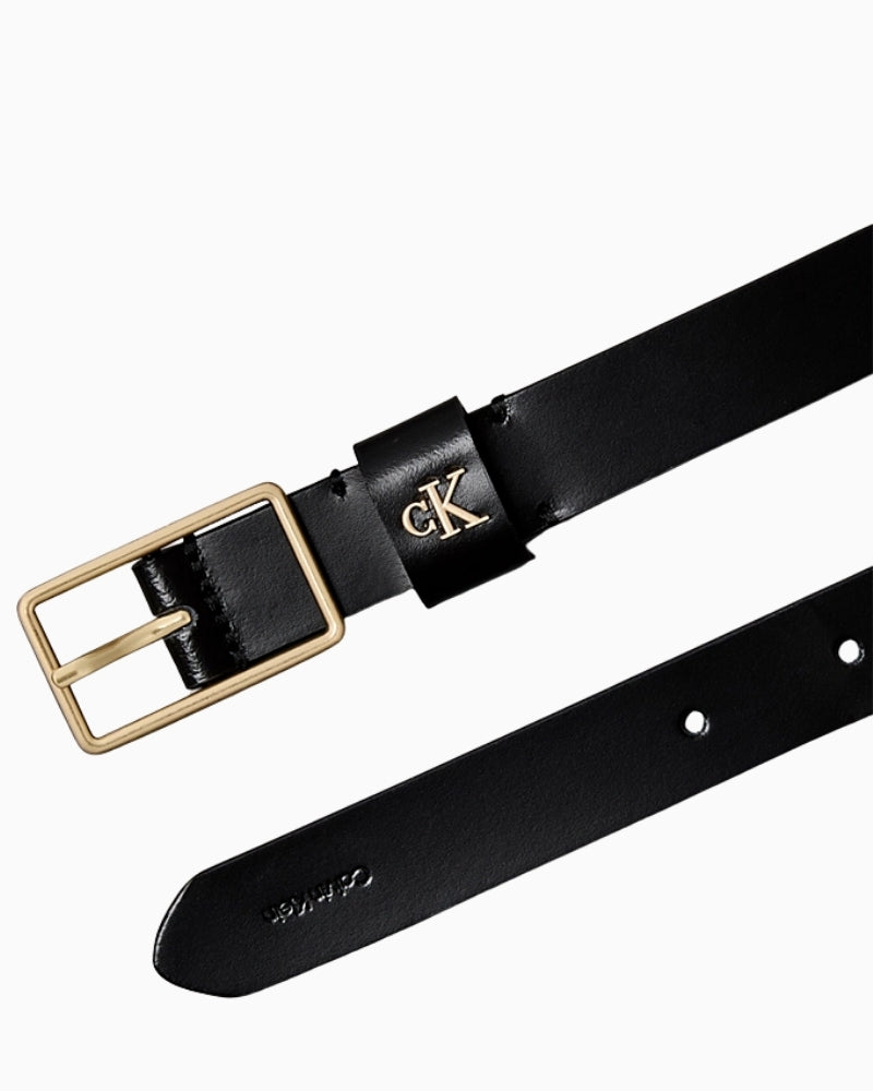 Close-up of monogram logo keeper tab on black leather belt
