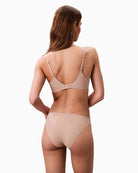 Back view showing hook fastening and cross-back strap option