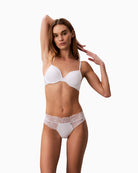 White Calvin Klein lace thong angled front view showing bonded edges – Áines Boutique