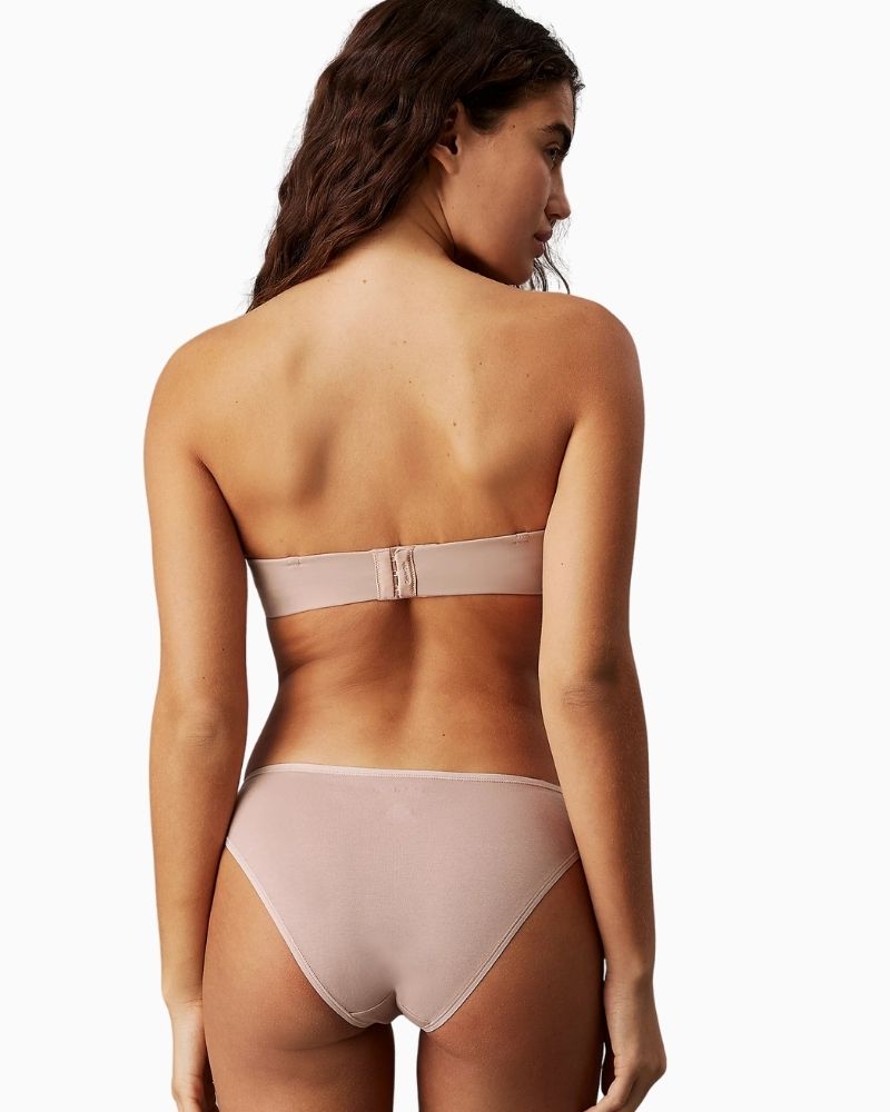 Back view highlighting hook fastening and optional straps on Calvin Klein demi bra