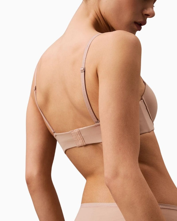 Back view of Calvin Klein strapless push-up bra with hook fastening