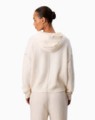 Back view of Calvin Klein loungewear hoodie showing simple silhouette