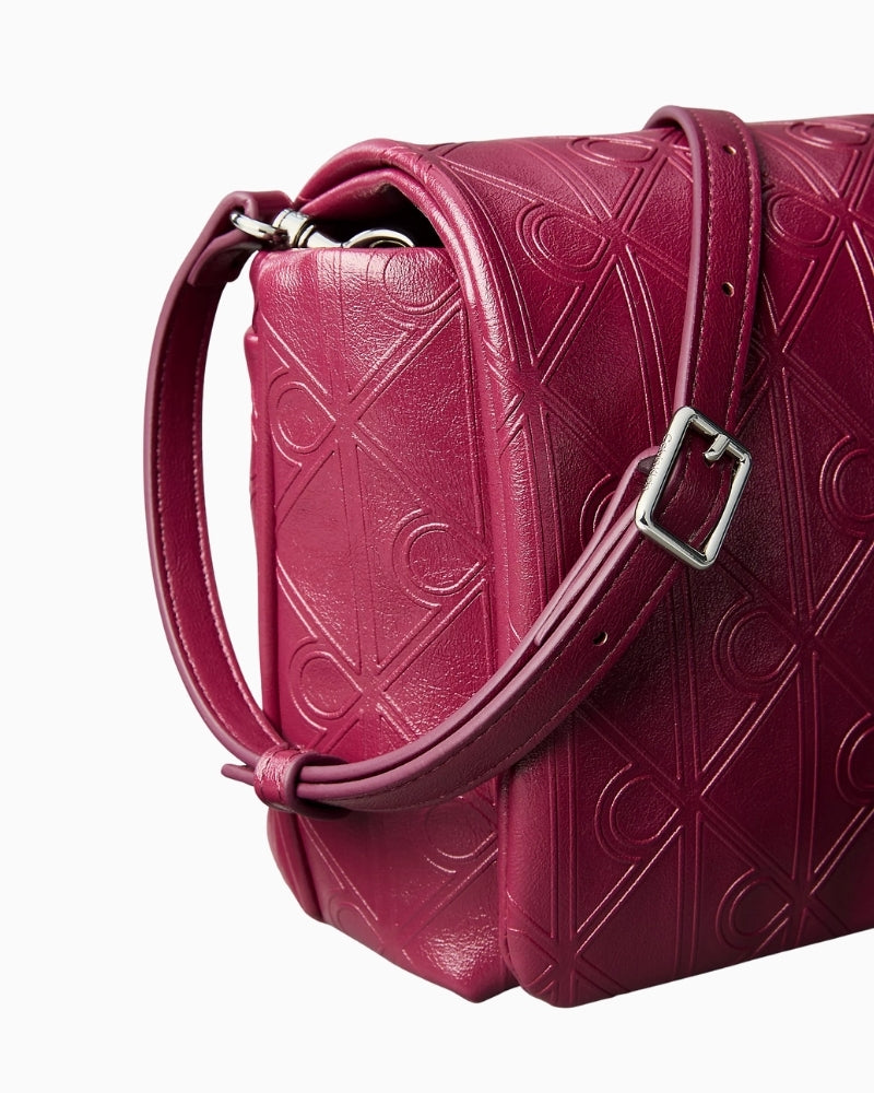 Calvin Klein Puffer Emblem Logo Flap Crossbody Bag side view – Áines Boutique