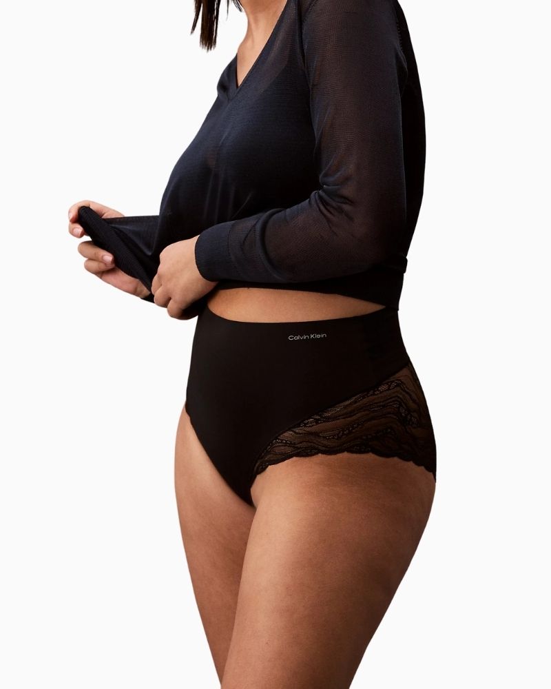 Close-up of black Calvin Klein high-rise shapewear brief with scalloped lace trim