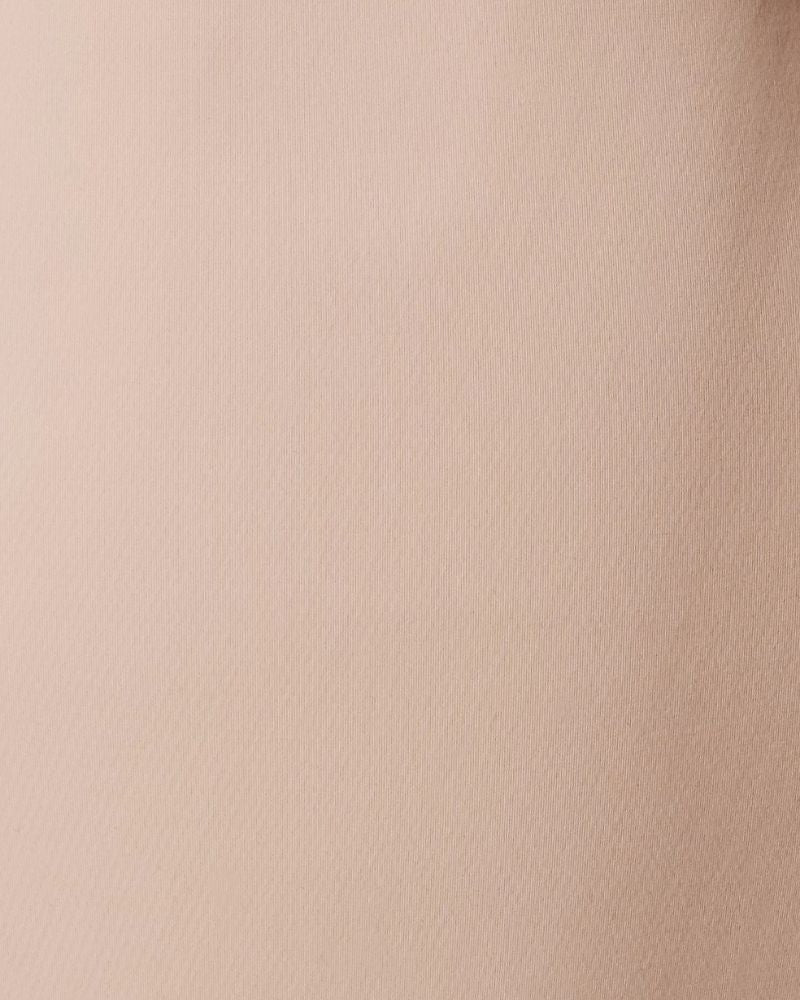 Close-up of Calvin Klein high-rise shapewear brief with scalloped lace trim