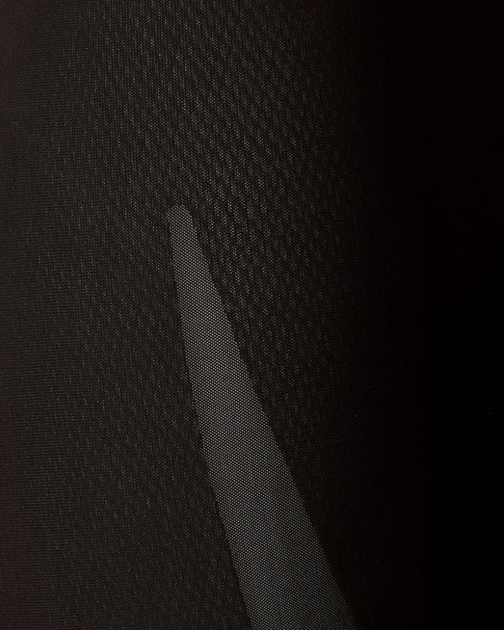 Close-up view of Calvin Klein shapewear shorts showing sculpting mesh panels