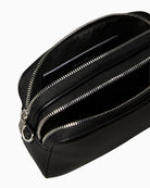 Close-up of webbing strap attachment and pocket stitching details