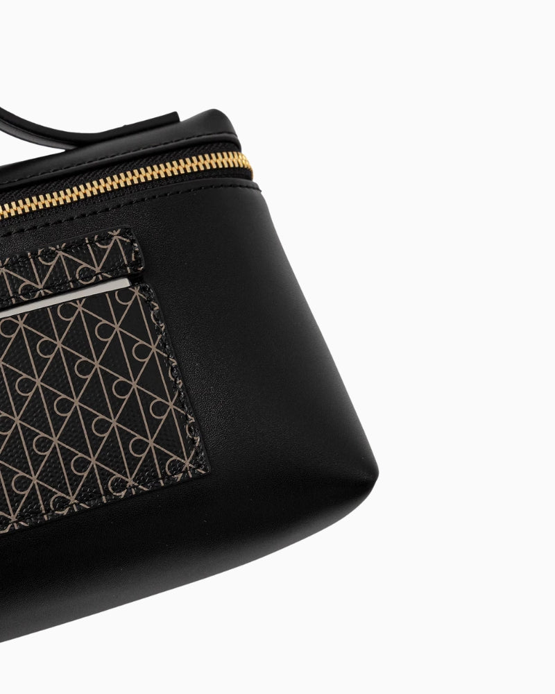 Calvin Klein black cosmetic bag angled view showing structure – Áines Boutique