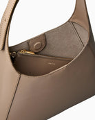 Calvin Klein engraved medium shoulder bag taupe interior view – Áines Boutique