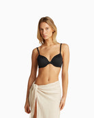 Close-up of Calvin Klein black bra with lightly padded full coverage cups