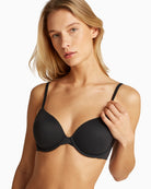 Model wearing Calvin Klein full coverage bra in classic black