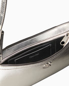 Calvin Klein metallic small shoulder bag in silver, interior view showing lining – Áines Boutique