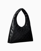 Calvin Klein puffer emblem logo shoulder bag, angled side view highlighting soft structure – Áines Boutique