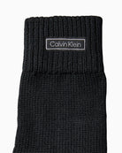 Cuff area close-up with Calvin Klein logo tag
