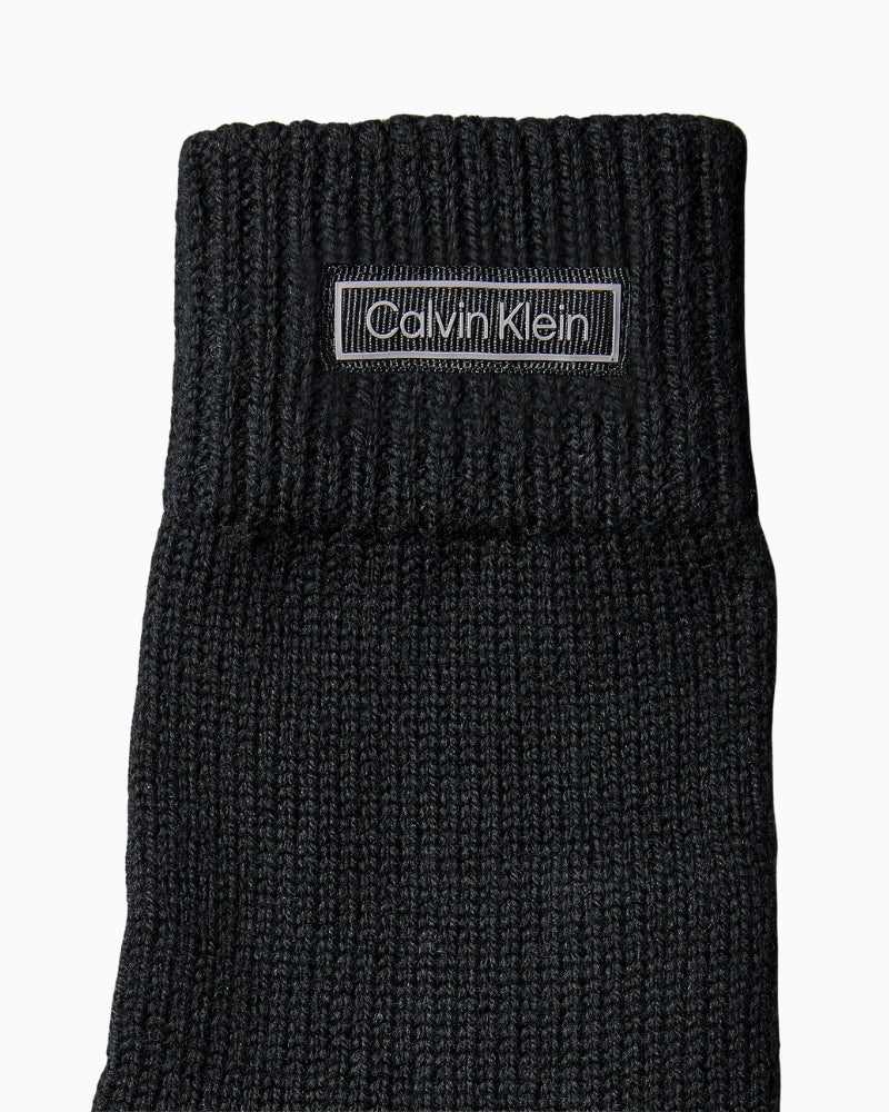 Cuff area close-up with Calvin Klein logo tag