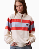 Front of Calvin Klein rugby stripe top in off white with 1/4 zip and stand collar
