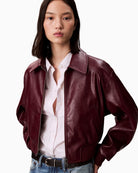 Close-up of faux leather texture and Calvin Klein branding