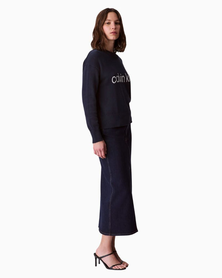 CK graphic top styled with jeans for a relaxed everyday look