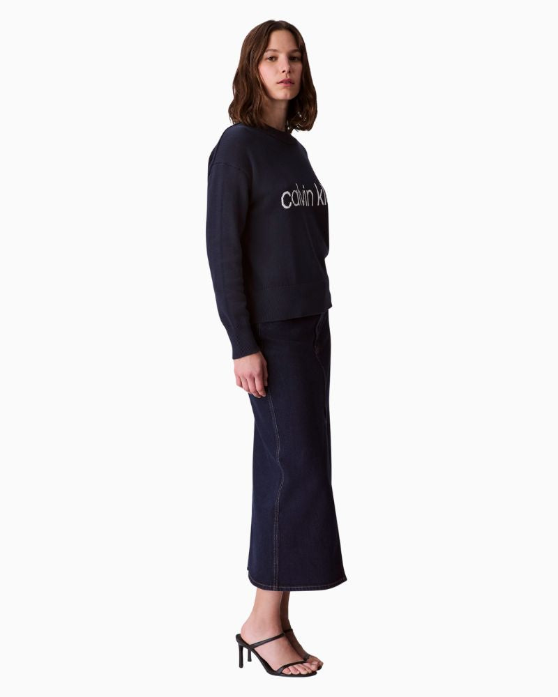 CK graphic top styled with jeans for a relaxed everyday look