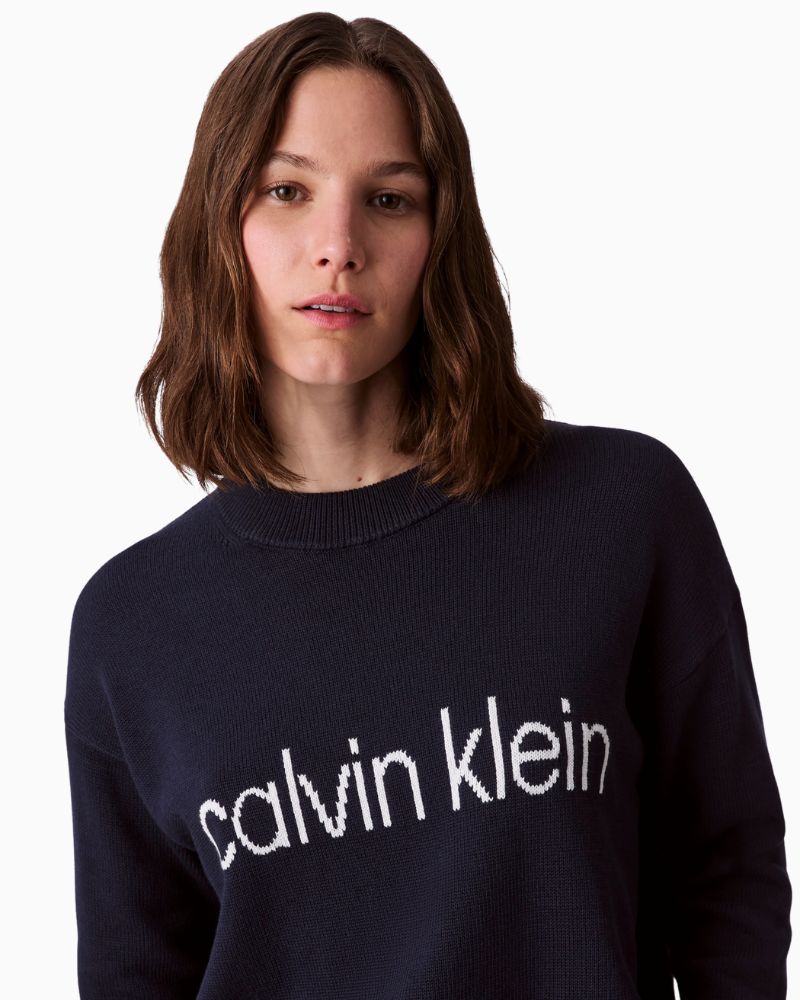 Close up of Calvin Klein cotton pullover with front graphic logo and crew neckline