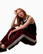 Side view of soft cotton-blend trousers showing structured silhouette