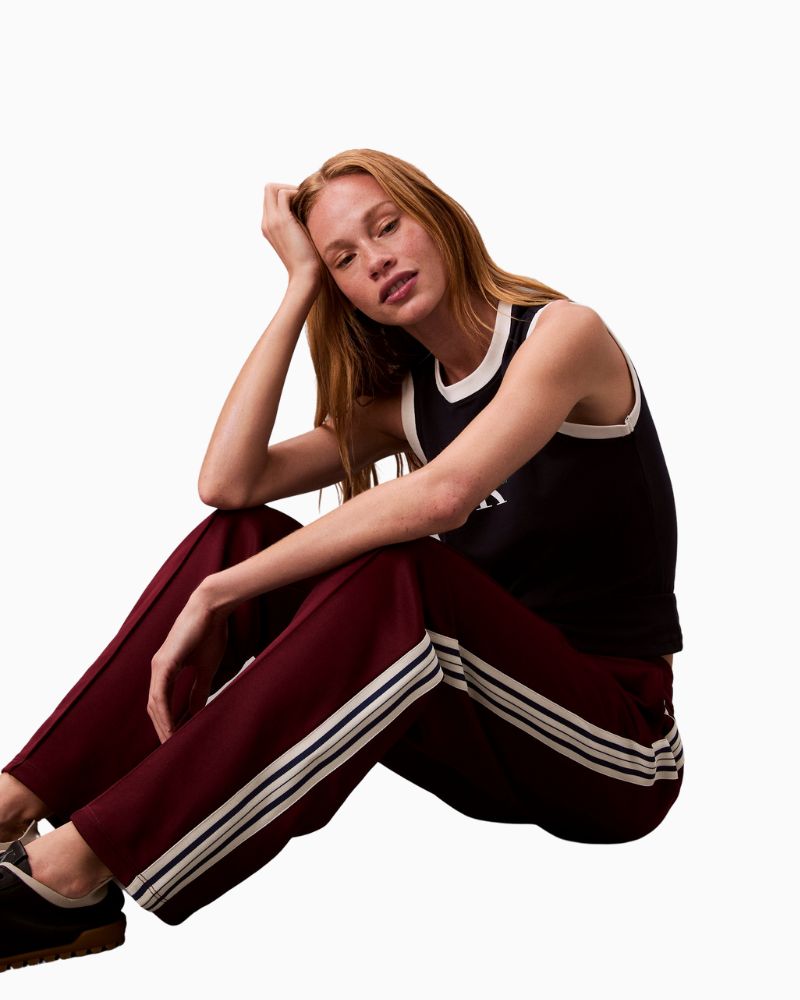 Side view of soft cotton-blend trousers showing structured silhouette